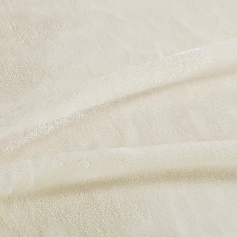 Cozy Twin-Sized Fleece Packable Blanket in Ivory