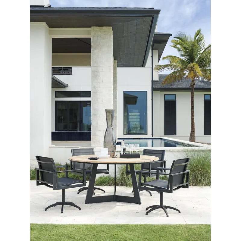 South Beach Sleek Black Aluminum and Teak Swivel Dining Armchair