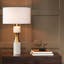 Elegant Brass and White Marble Dual-Light Table Lamp with Linen Shade