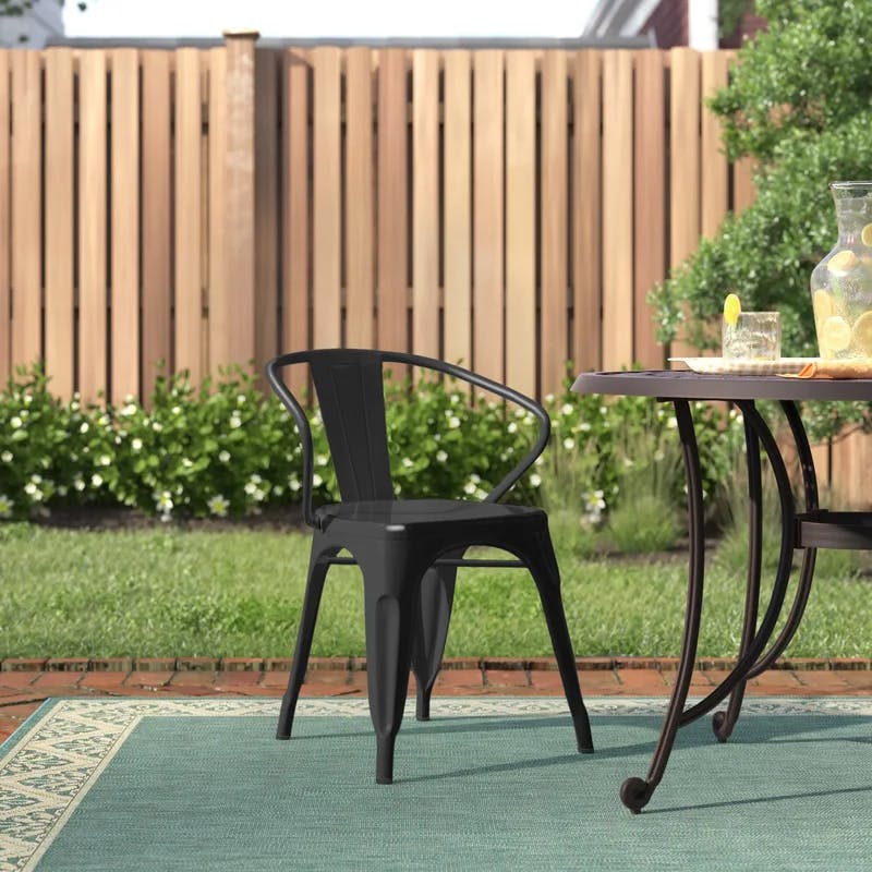 Sleek Black Steel Stackable Indoor-Outdoor Dining Armchair