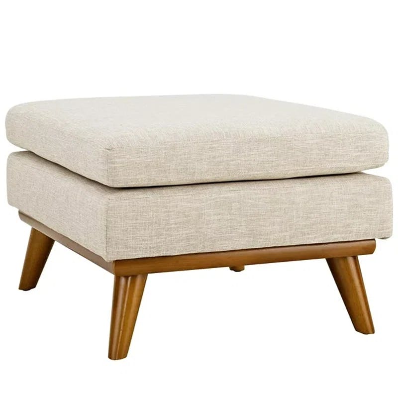 Plush Beige Fabric Ottoman with Sloping Curves and Solid Rubberwood Base