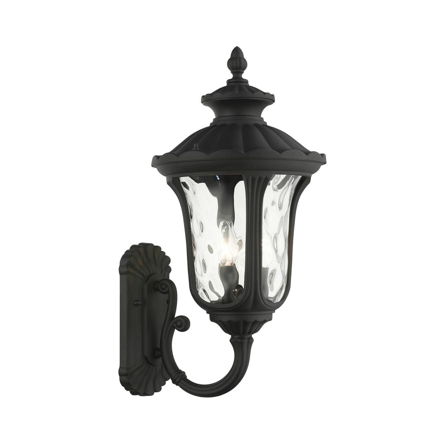 Artisanal Textured Black 3-Light Outdoor Lantern Sconce with Clear Water Glass