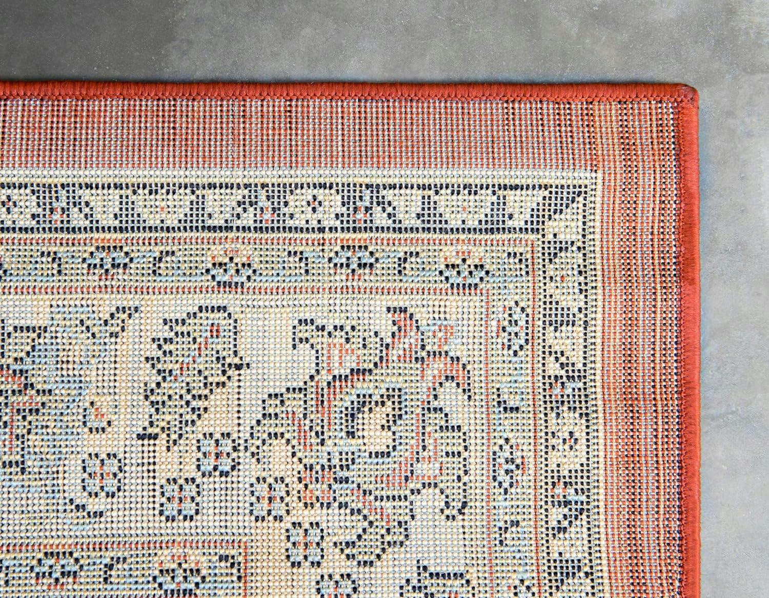Terracotta and Ivory Synthetic 4' x 6' Easy-Care Rug