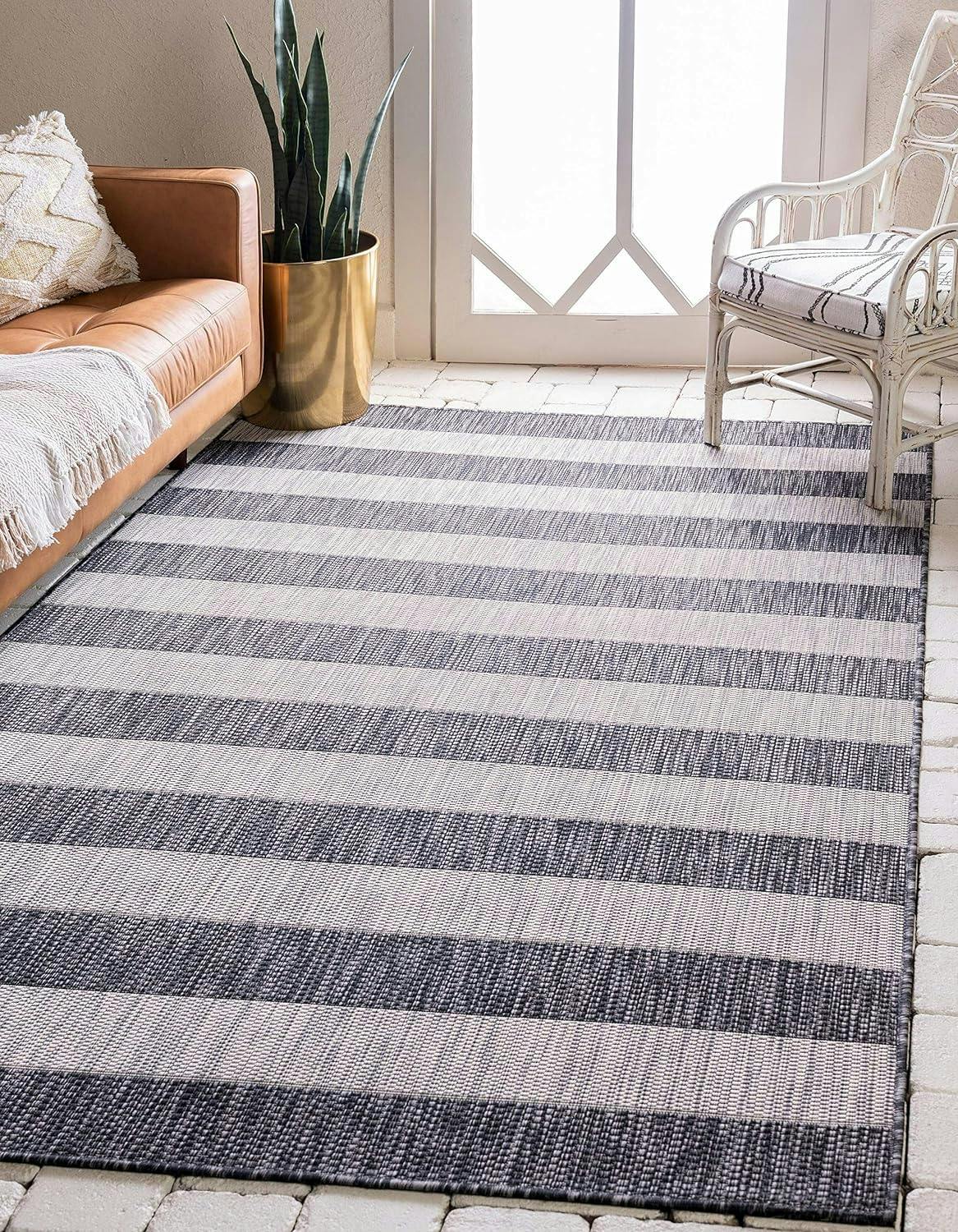 Charcoal Gray and Black Striped Synthetic Outdoor Rug 7' x 10'