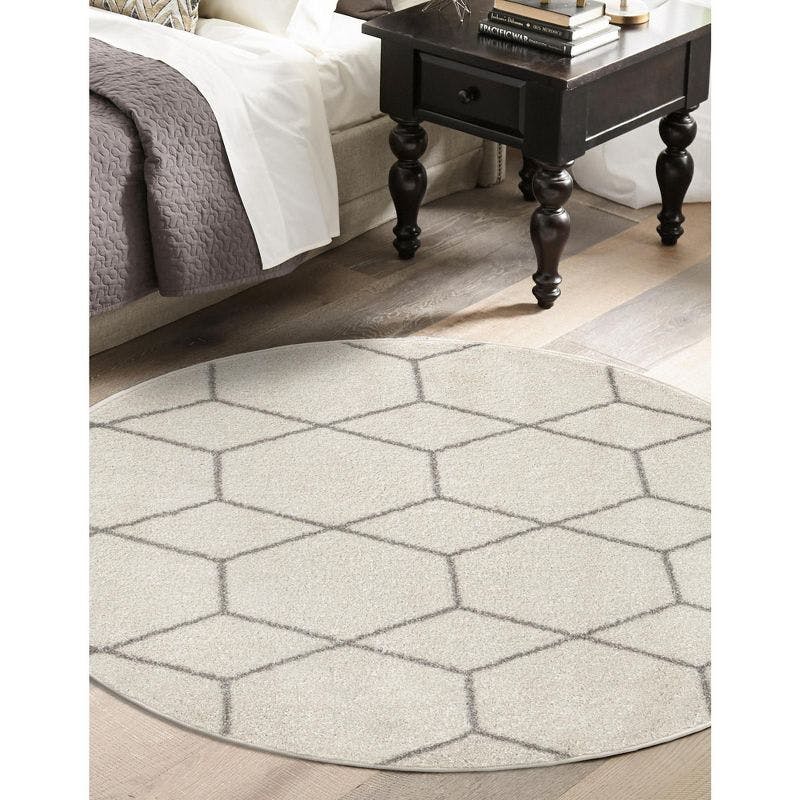 Ivory Round Trellis Easy-Care Synthetic Rug 7'