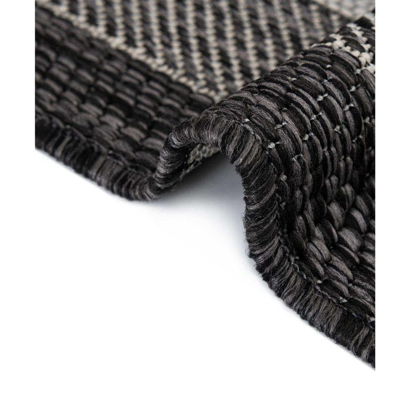 Easy-Care Reversible Black Synthetic Outdoor Rug 4' x 6'