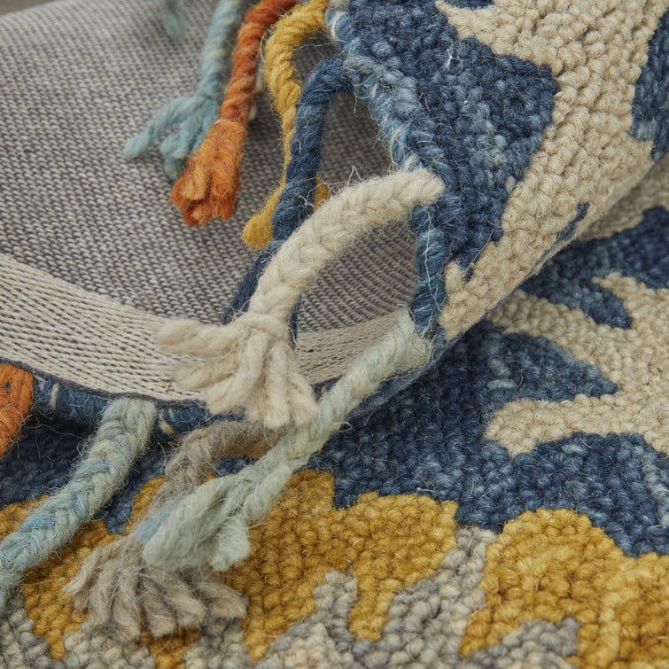 Broaderick 3'6"x5'6" Blue/Yellow/Orange Hand Tufted Wool Rug