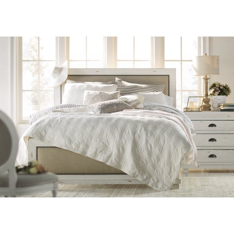 Wolferstorn Queen Distressed White Upholstered Bed