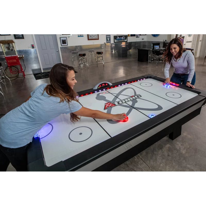 Atomic Top Shelf 7.5' Multicolor LED Air Hockey Table with Accessories