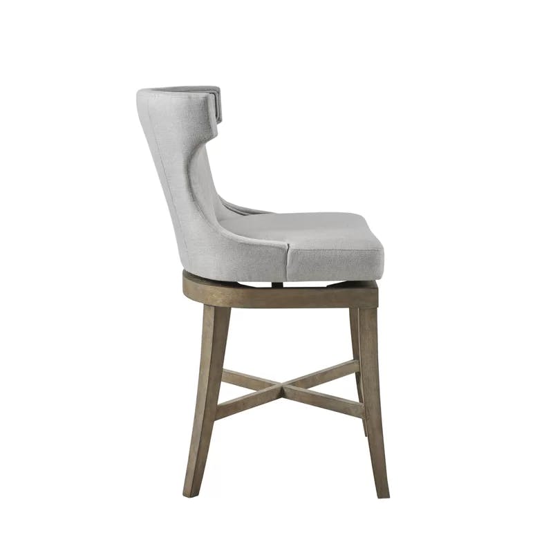 Elegant Light Grey Wingback Swivel Counter Stool with Bronze Accents