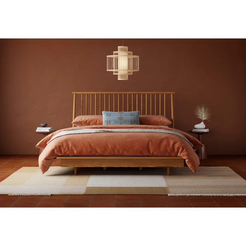Cassius Light Brown Queen Bed with Spindle Headboard and Storage Drawer