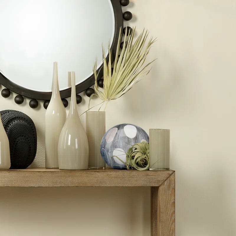 Sophisticated Cobblestone-Inspired Cream and Black Ceramic Orb