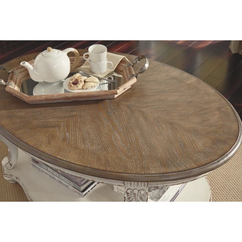 Antiqued Two-Tone Oval Wood Coffee Table with Cabriole Legs