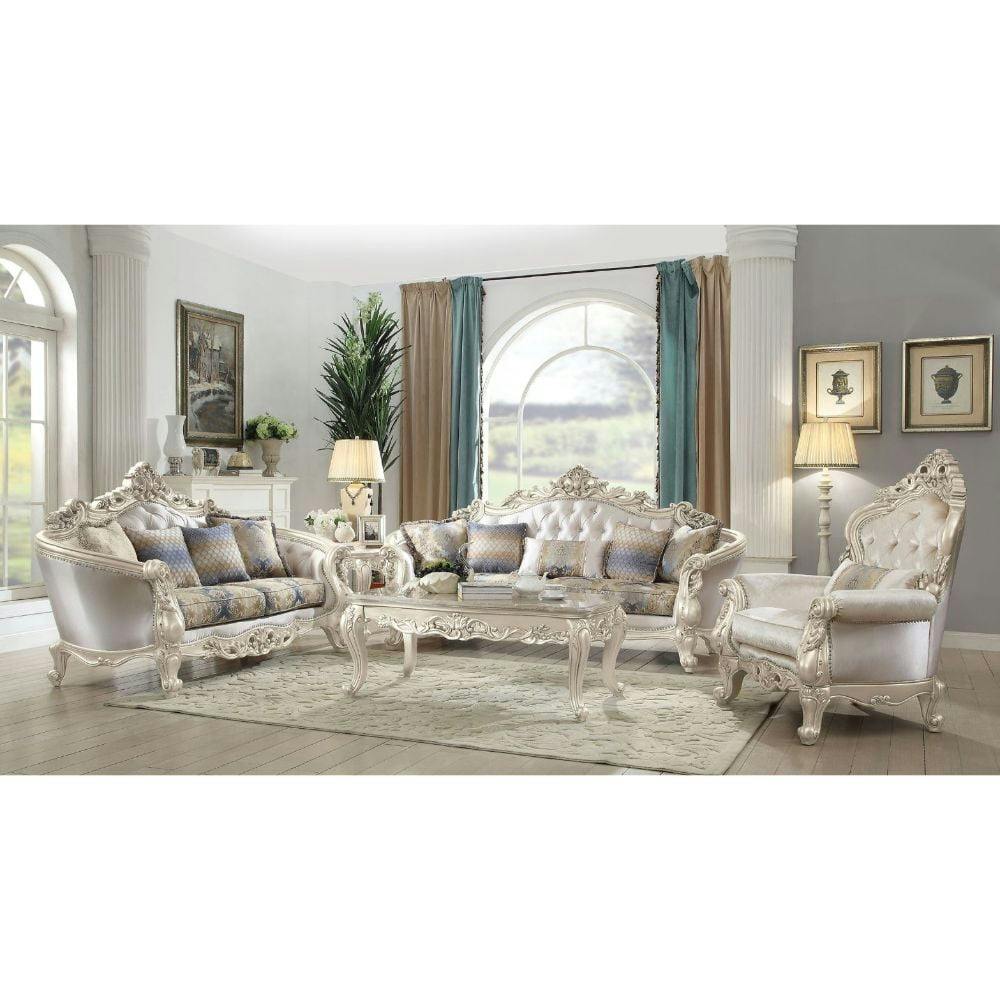 Elegant Floral Tufted Fabric Loveseat with Rolled Arms and Nailhead Accents