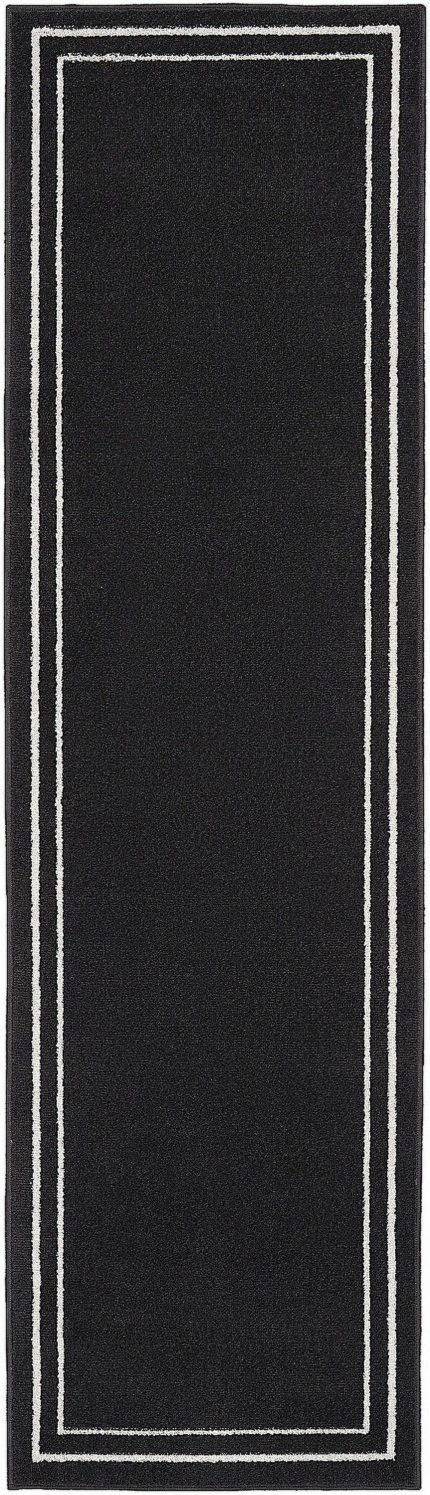 Essential Elegance 24" x 72" Black and Ivory Washable Outdoor Rug