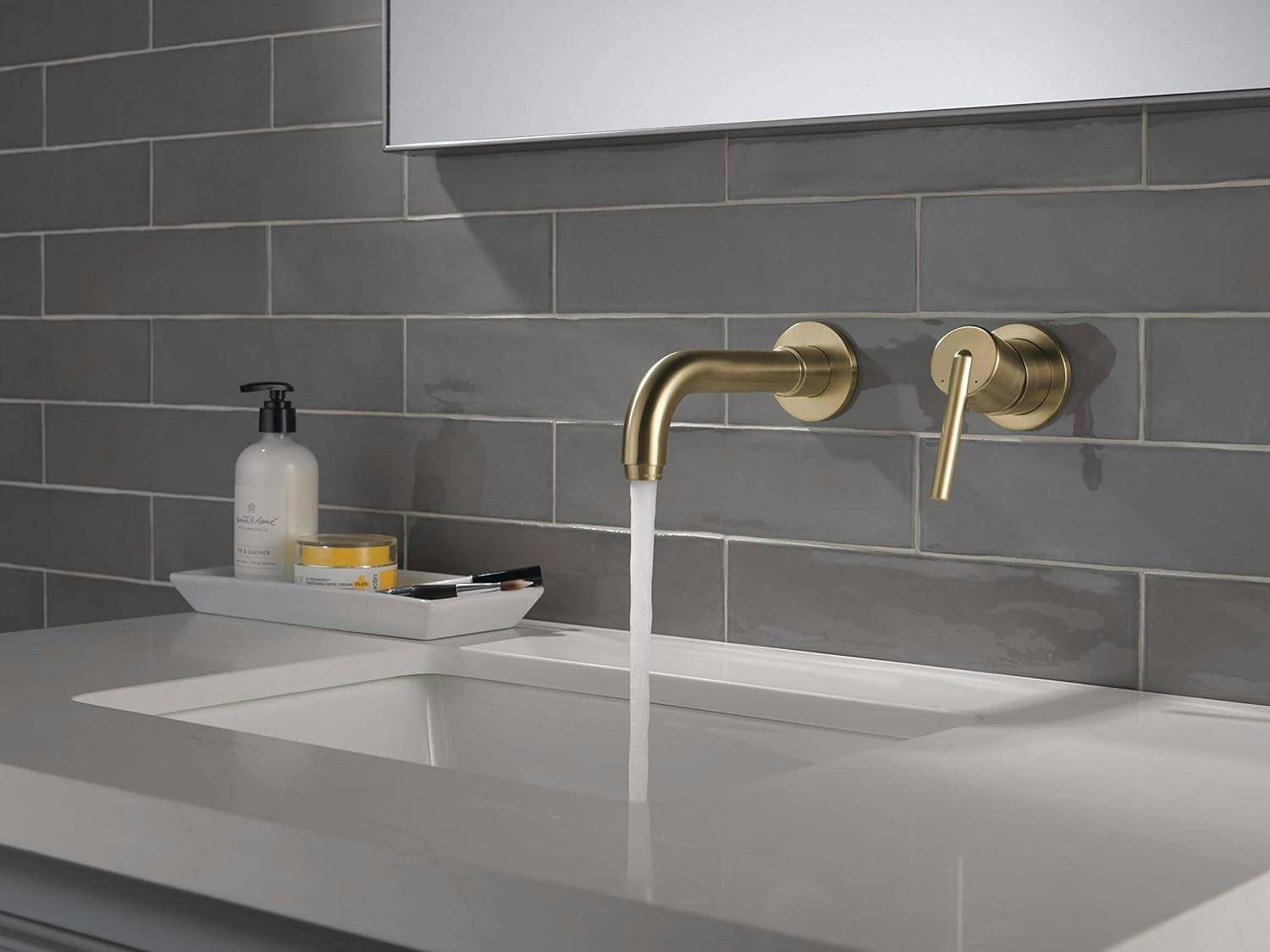 Trinsic Champagne Bronze Wall Mounted Bathroom Faucet