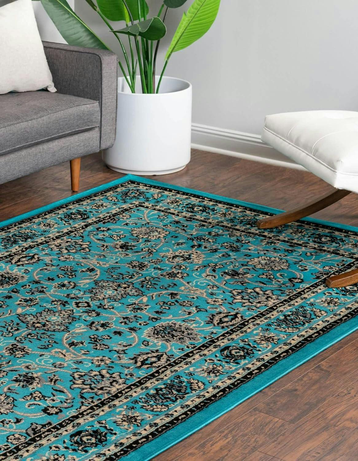 Turquoise and Ivory Synthetic 4' x 6' Easy-Care Rectangular Rug