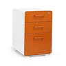 Poppin Stow 3-Drawer File Cabinet - White + Orange. 2 Utility Drawers and 1 Hanging File Drawer. Fully Painted Inside and Out. Powder-Coated Steel. Two Keys Included.
