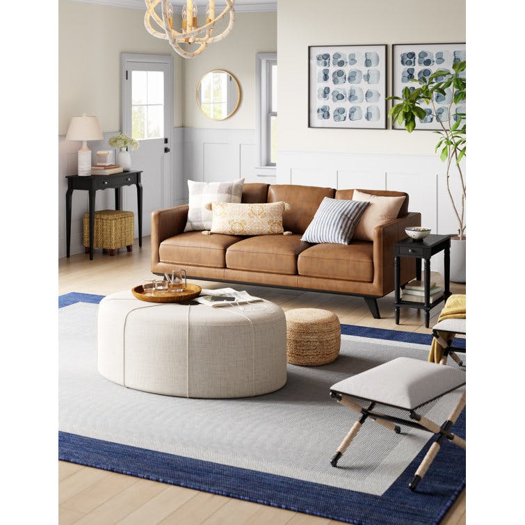 Christopher Tufted Oval Cocktail Ottoman