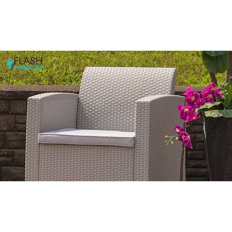 Contemporary Patio Armchair with Light Gray Cushions and Plastic Feet